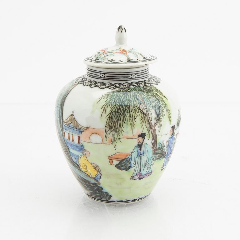 A Chinese 20th century Yixing ware tea service and a porcelain tea caddie.