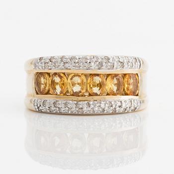 Ring, 14K gold with small diamonds and yellow colored stones.