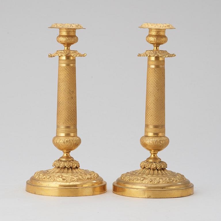 A pair of Russian 1830/40's brass candlesticks.