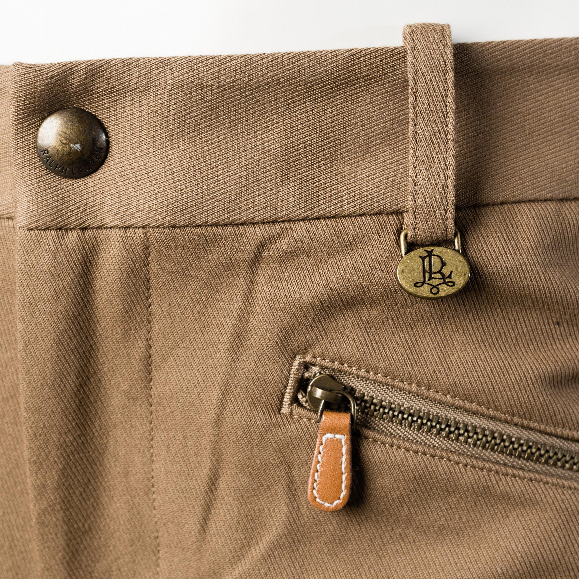 Three pair of trosers by Ralph Lauren.