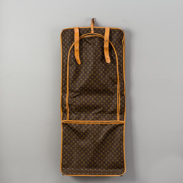 A Louis Vuitton vintage Monogram Canvas Homme Garment Bag.