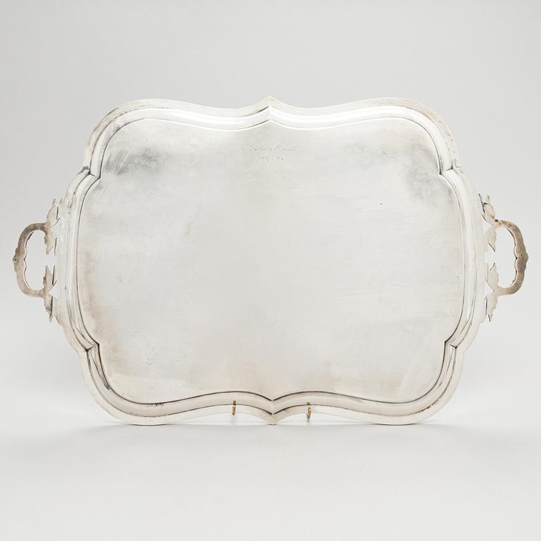 A Russian silver tray, Moscow, maker's mark IV. Unclear year mark, assay master mark Aleksandr Kudrin (1878-82).