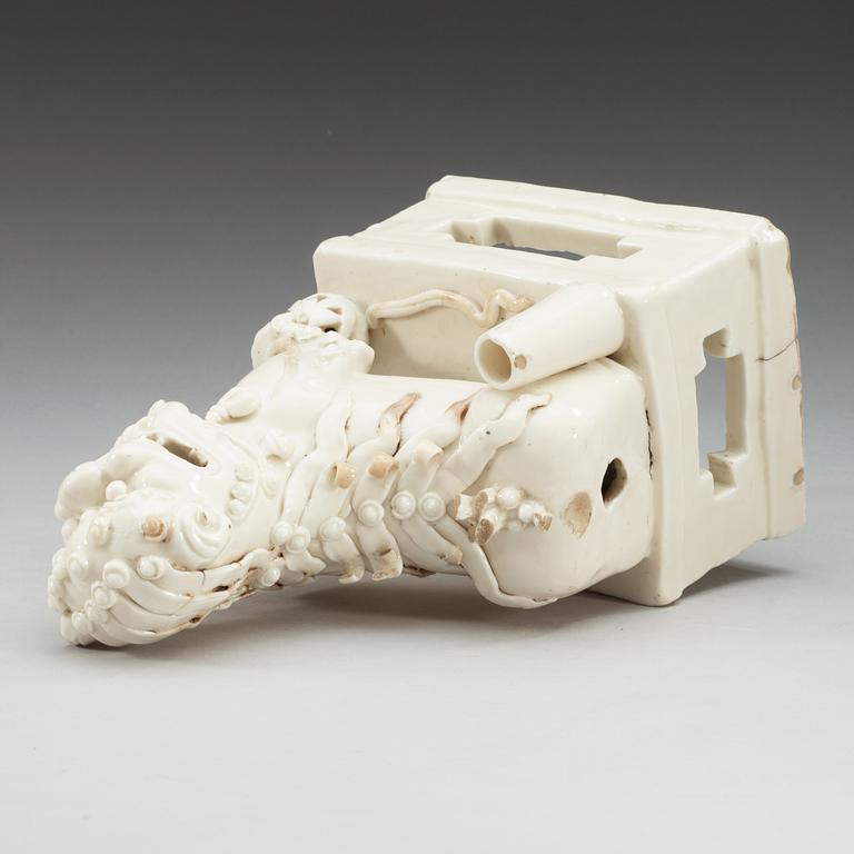 A blanc de chine censer, in the shape of a sitting Buddhist lion, Transition, 17th Century.