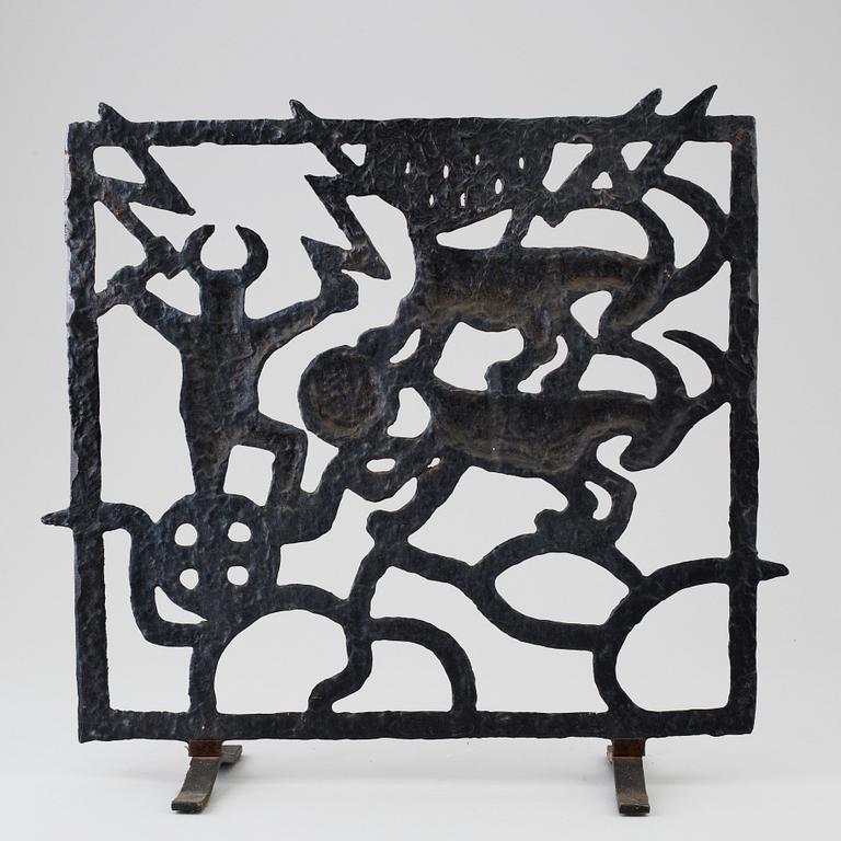 A cast iron fire guard by Olle Hermansson, Husqvarna.