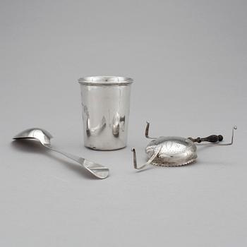 A spoon, a tea spider and a cup in silver, early to late 19th century. Total weight 143 g.