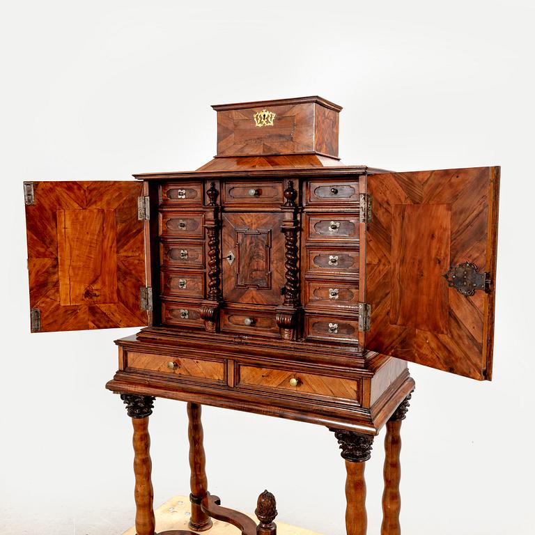 A first half of the 18th century walnut cabinet.