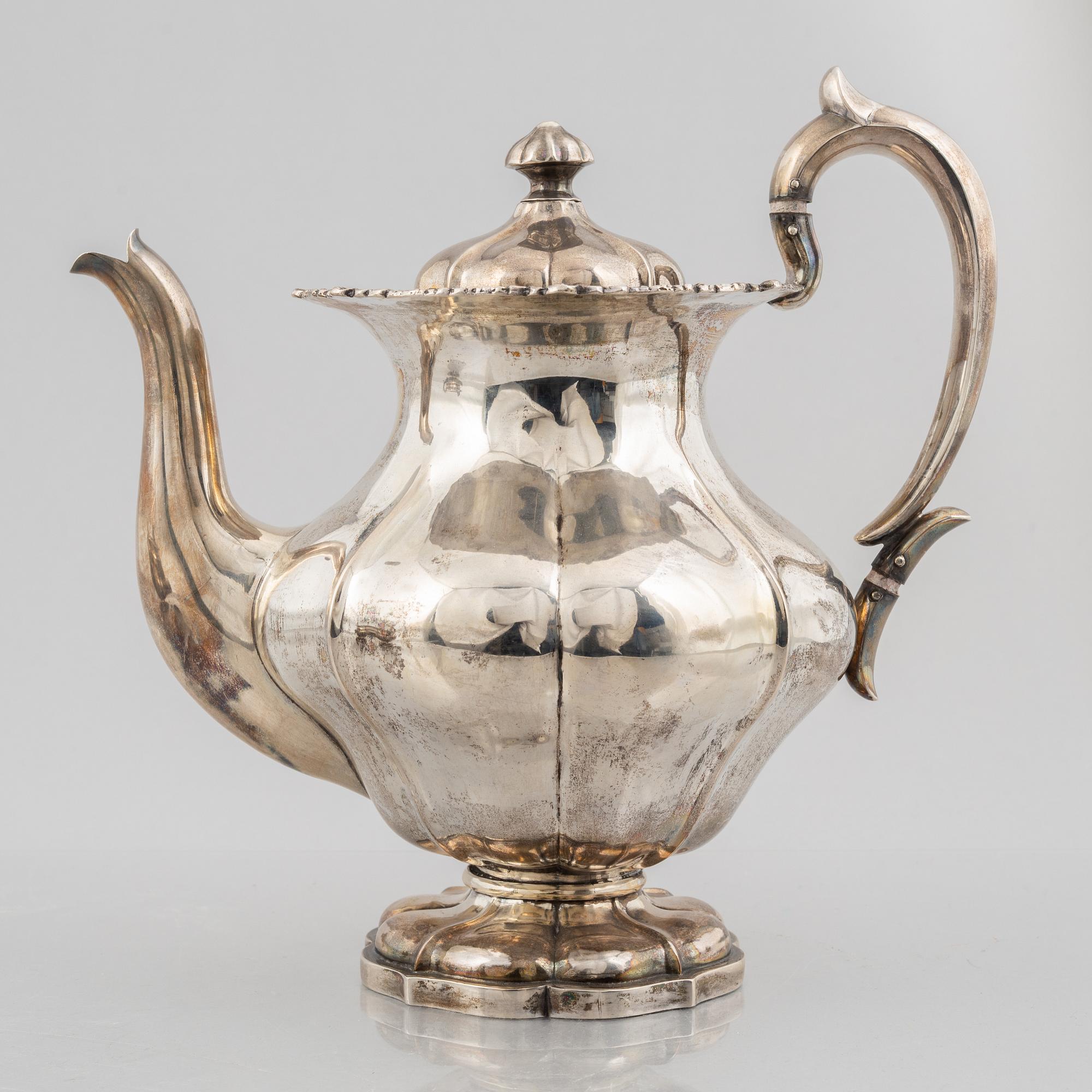 A silver coffee pot and a sugarbowl, marks of J. Mynttinen, Helsinki, Finland 1932.