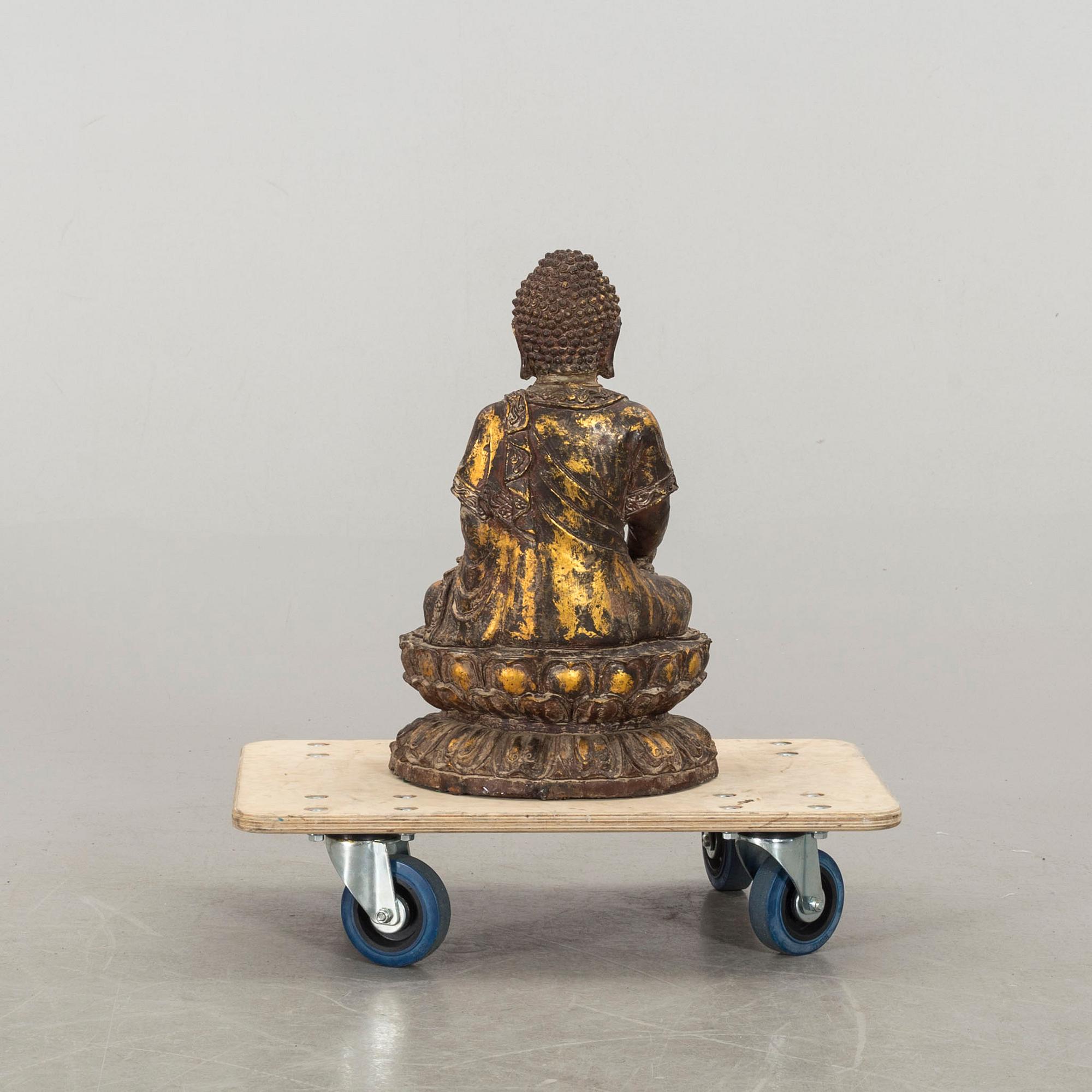 A Ming style gilded bronze Buddha.