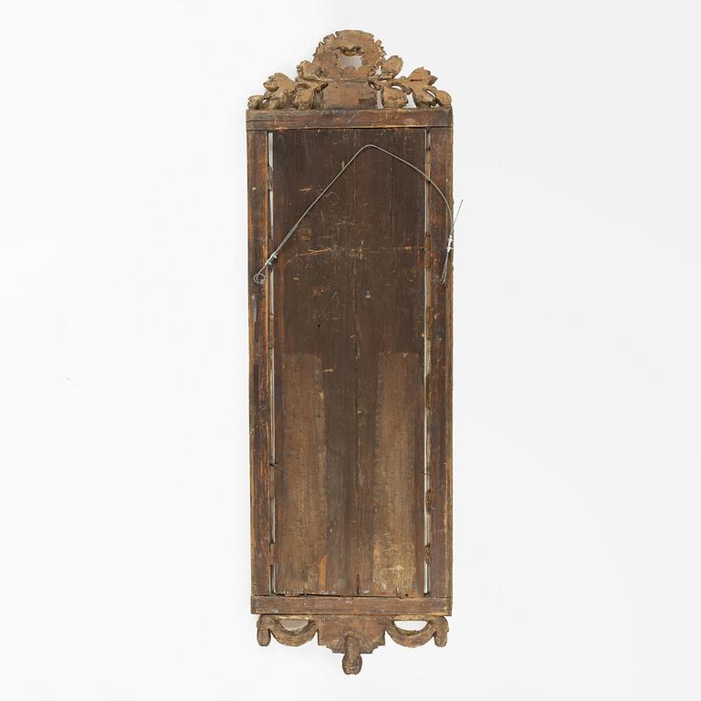 A Gustavian giltwood mirror, Stockholm, late 18th century.