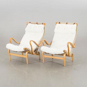 BRUNO MATHSSON, a pair of Pernilla, Dux lounge chair.