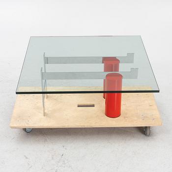 A coffee table with glass top, late 20th Century.