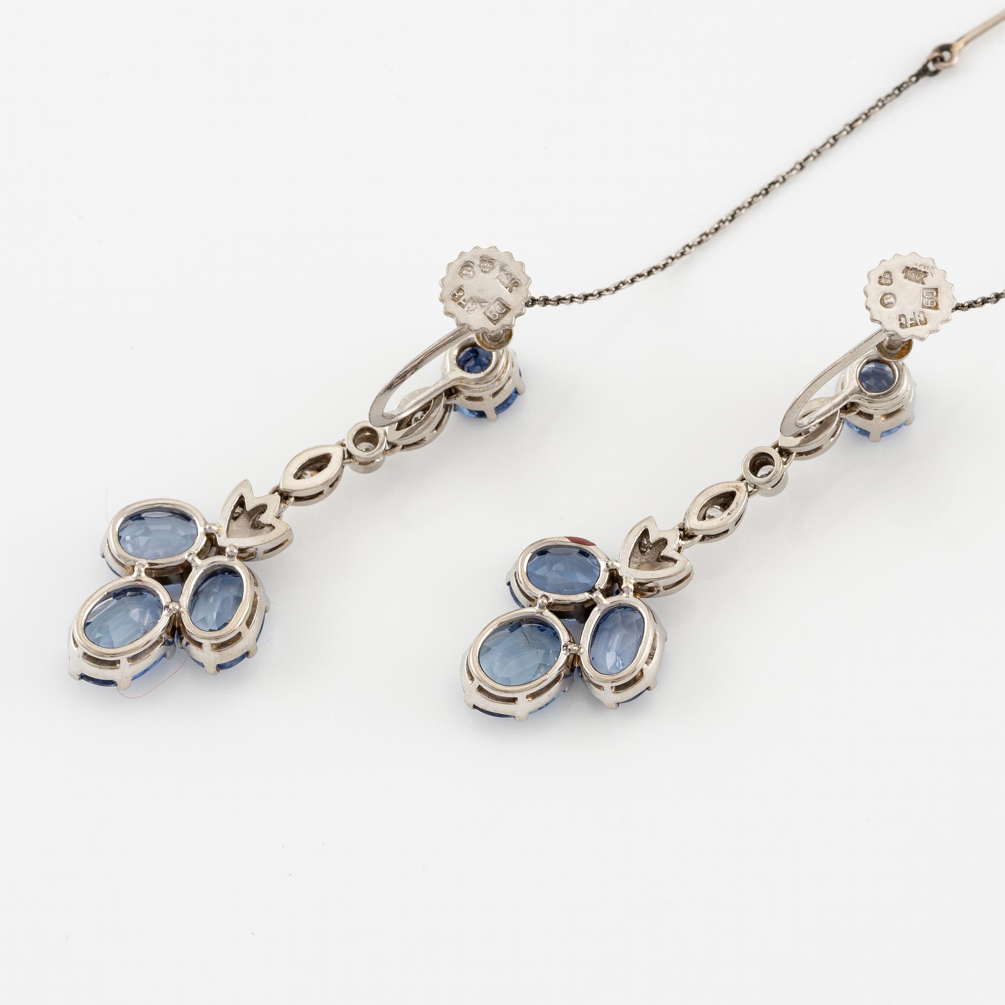 A pair of earrings with sapphires and diamonds, stamped Carlman.