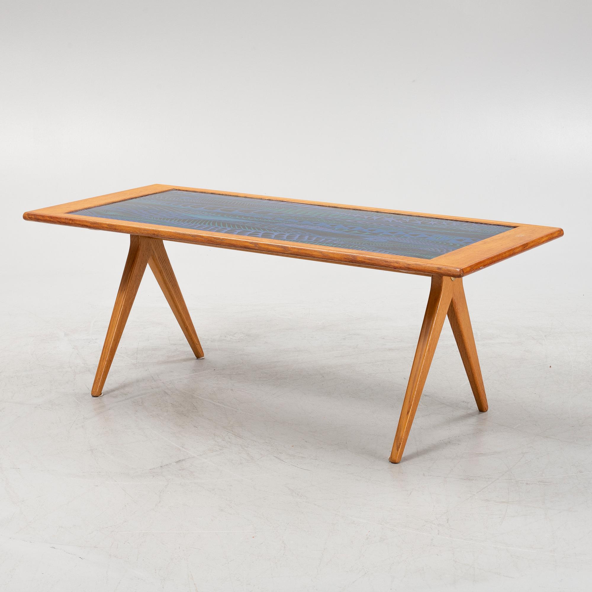 Stig Lindberg & David Rosén, an oak and enamel coffee table from Nordiska Kompaniet and Gustavsberg, 1950's.