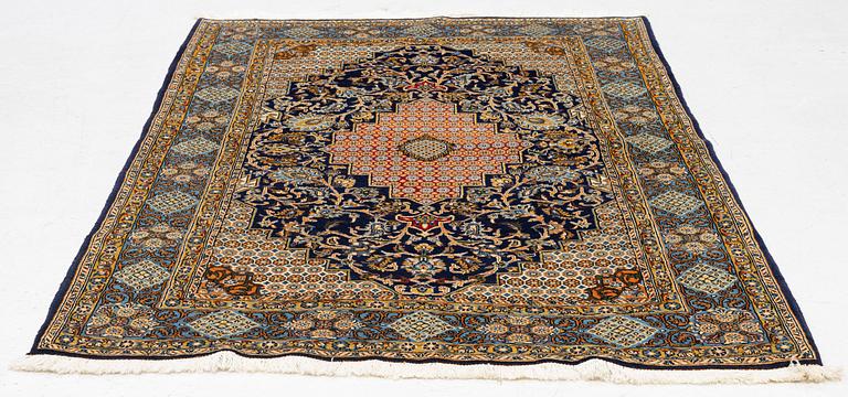 A Ghom/Shahreza rug, c. 202 x 140 cm.