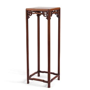 901. A Chinese hardwood tall table, 20th century.