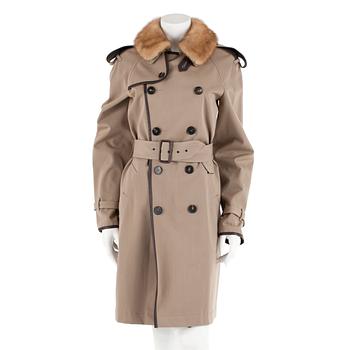 390. JEAN PAUL GAULTIER, a beige woolblend trenchcoat. Italian size 44.