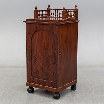 A Swedish Empire cupboard, first half of the 19th century.