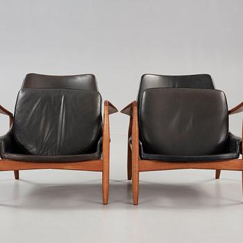 Ib Kofod-Larsen, a pair of 'Seal' easy chairs, Olof Persson Möbler, Sweden 1960's.