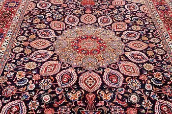 A Meshed carpet, c. 352 x 255 cm.