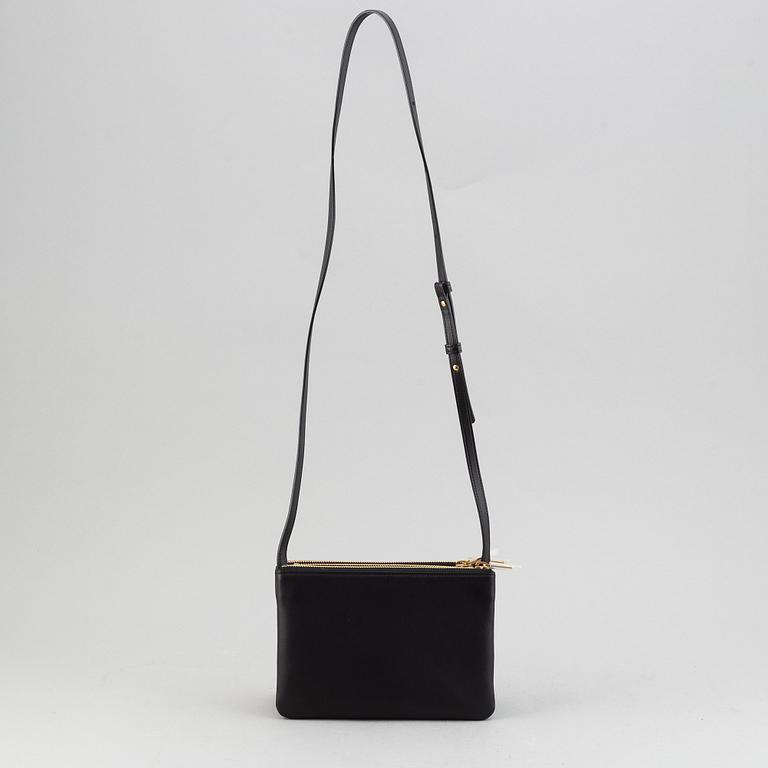 Céline, a black leather 'Trio Bag'.