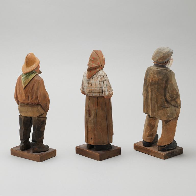 and CARL JOHAN TRYGG, three wooden sculptures, signed and dated, 1940s.