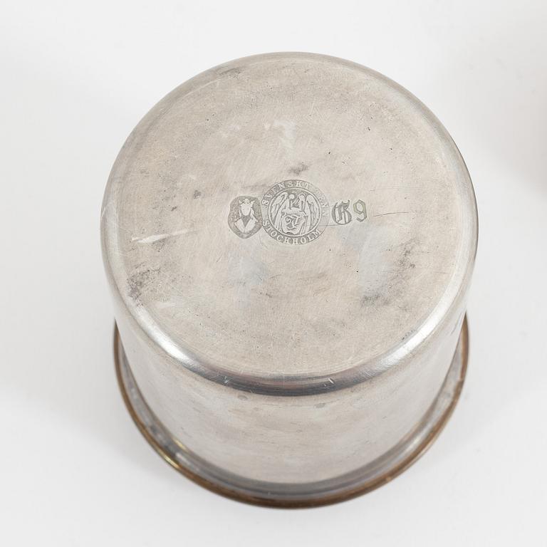 Estrid Ericson, A pewter and brass jar with cover, Firma Svenskt Tenn, Stockholm, 1957.