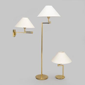 A 1970s/80s brass floor lamp, wall lamp and table lamp for Hövik verk.