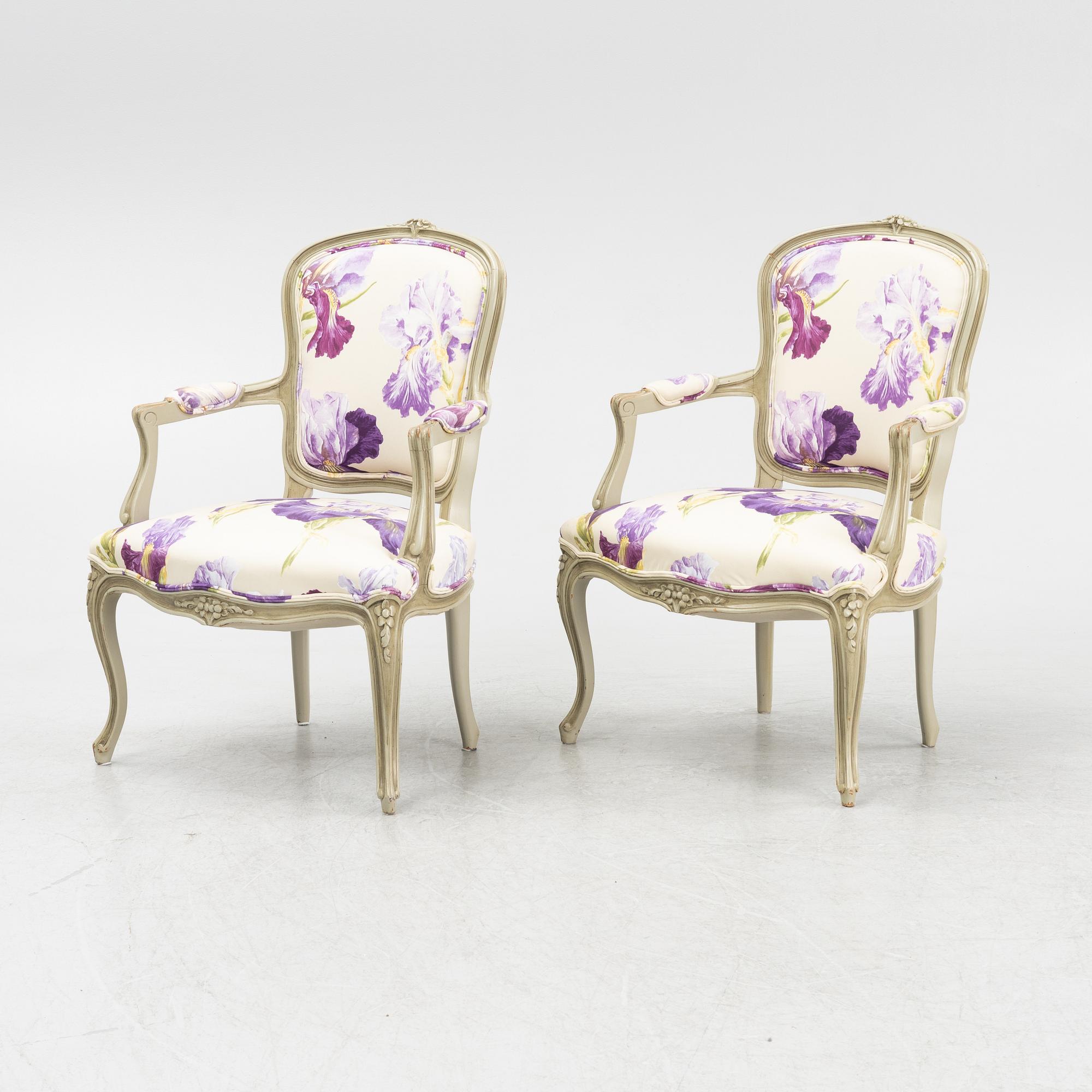 A pair of rococo style armchairs, 20th Century.