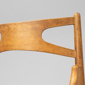 A set of six model CH 29 'Savbukstolen' by Hans J Wegner, designed 1952.