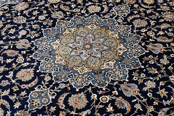 A Royal Keshan carpet, signed, c. 395 x 295 cm.