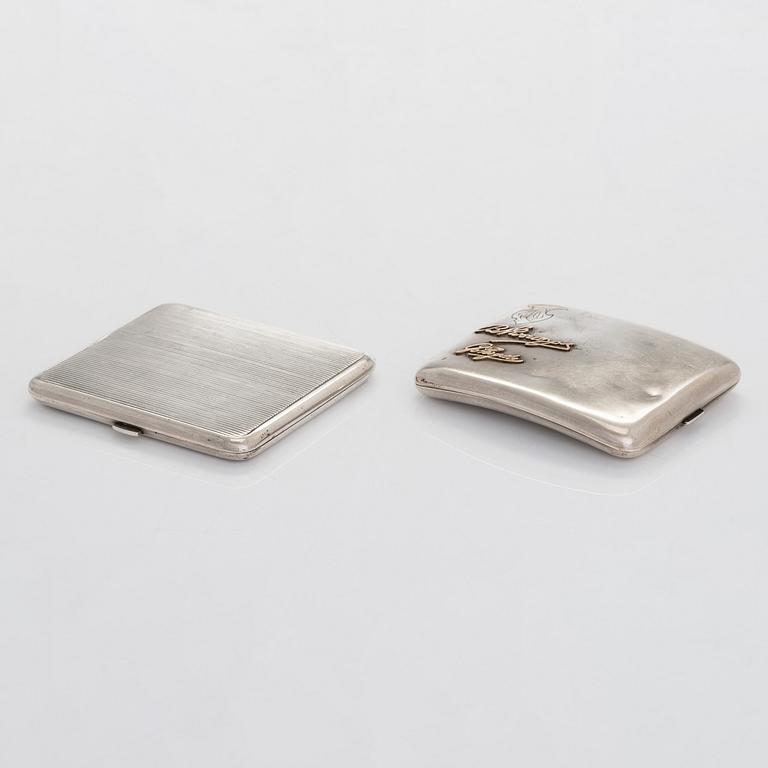 Two silver cigarette cases, J. H. Werner, Berlin, 1922, and Huguenin Frères, Switzerland before 1933.