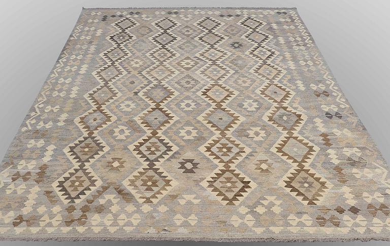 A carpet, Kilim, ca 299 x 209 cm.