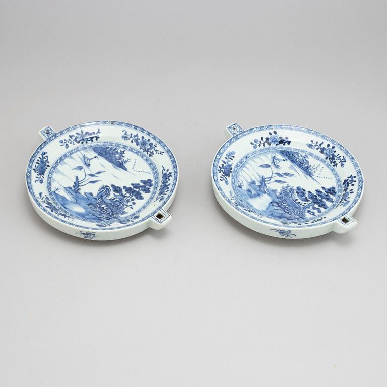 A pair of blue and white hot water dishes, Qing dynasty, Qianlong (1736-95).