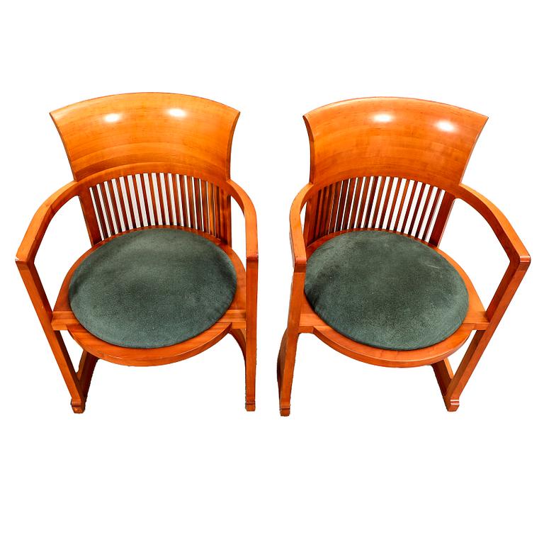 Frank Lloyd Wright, a pair of Barrel chairs model no 606 for Cassina numbered and dated 1986.