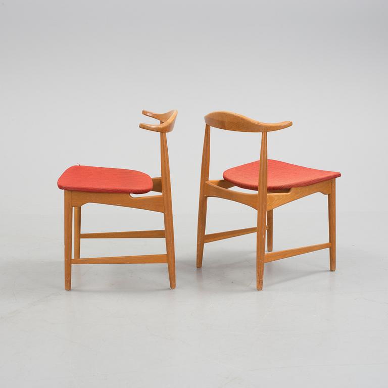 A pair of "Danske" chairs by IKEA.