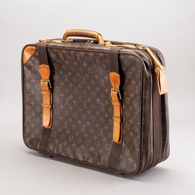 LOUIS VUITTON reväska.