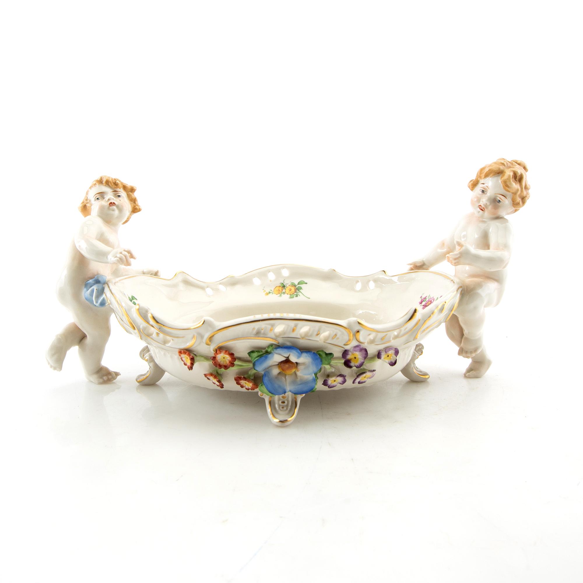 Bowl and candlesticks, a pair, Rococo style, Germany, first half of the 20th century, porcelain.