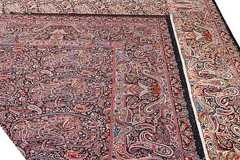A Boteh pattern Kerman carpet, c. 475 x 342 cm.