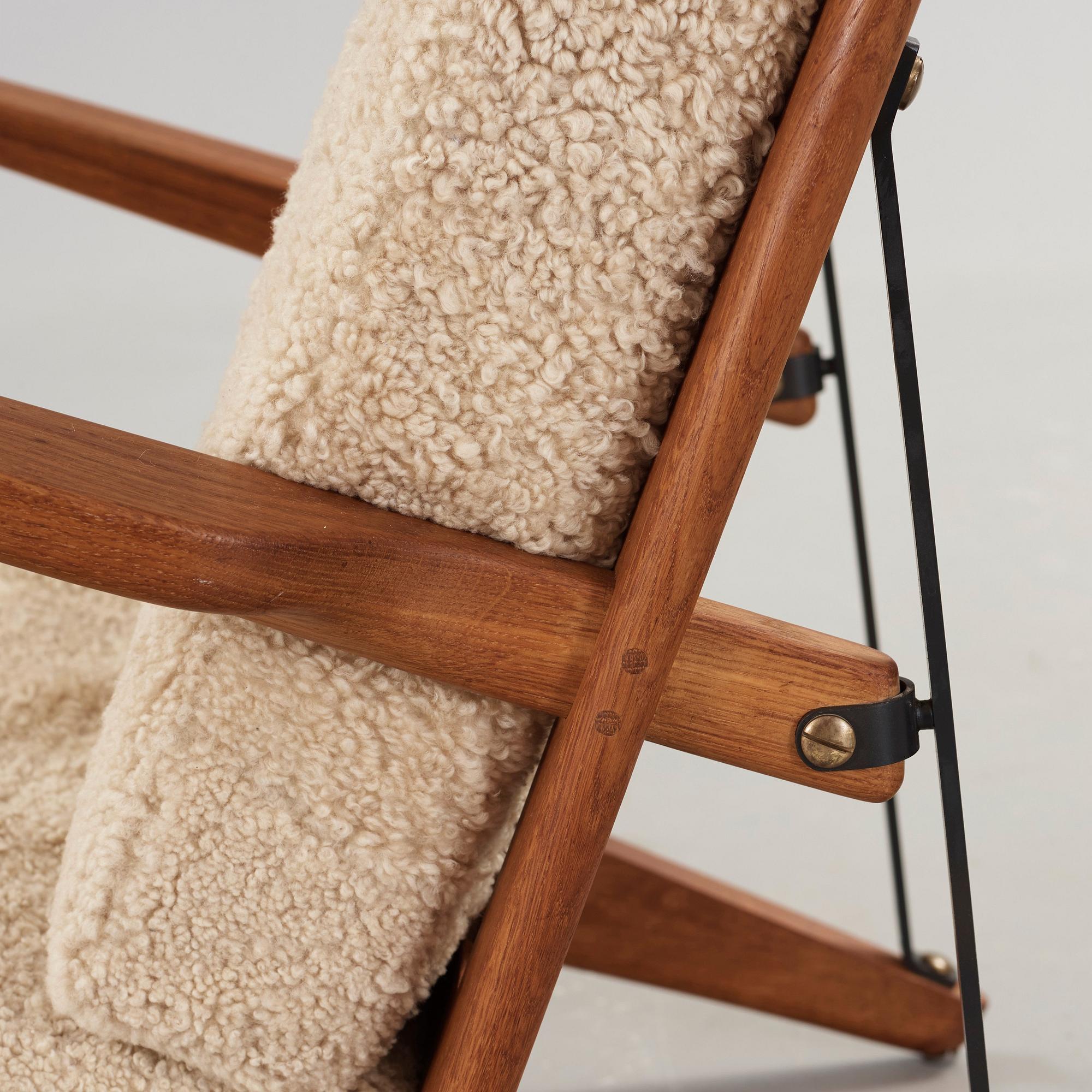 Børge Mogensen, an oak and iron easy chair, Fredericia, Denmark 1950's.