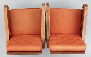 Axel Einar Hjorth, attributed, a pair of stained pine "Lovö" easy chairs, Nordiska Kompaniet, Sweden 1930's.