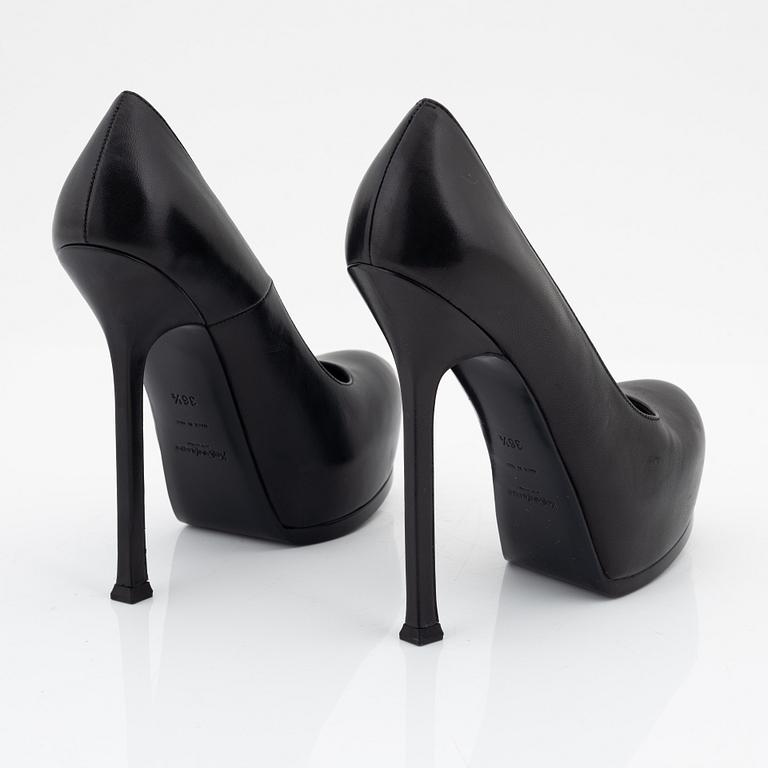 Yves Saint Laurent, a pair of black leather platform pumps, size 36 1/2.