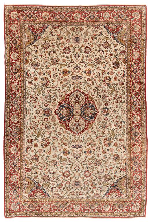 A mid 20th century central persian silk Qum carpet, c. 320 x 212 cm.