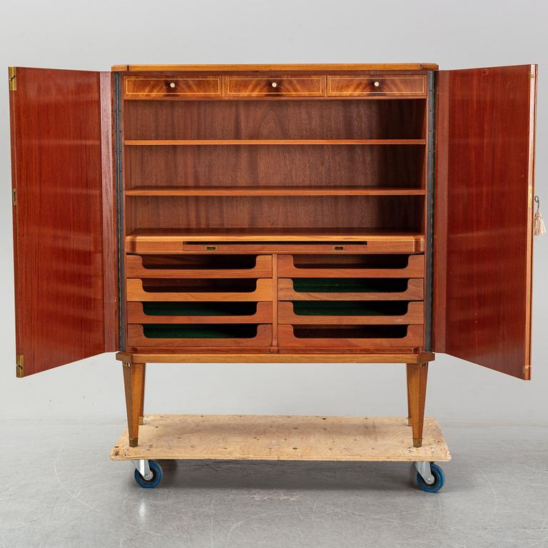 A mid 20th century mahogany veneered cabinet, Bodafors.