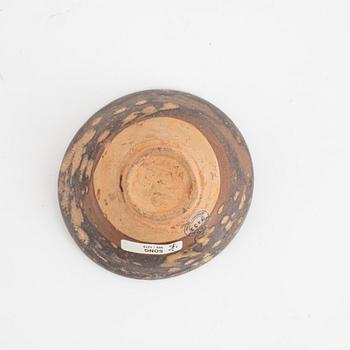 A tenmoku glazed bowl, Song dynasty (960-1279).