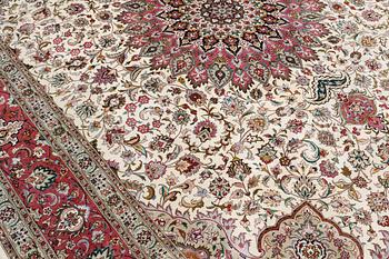 A carpet, Tabriz part silk, so called 50 Raj, cm 400 x 300 cm.