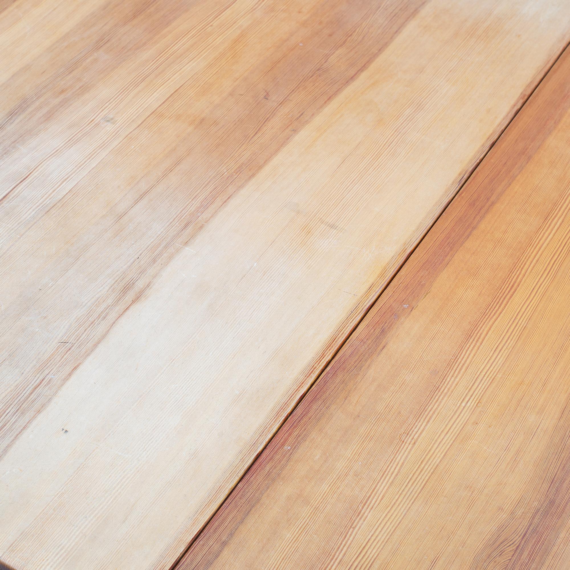 Carl Malmsten, a pine dining table and 6 chairs.