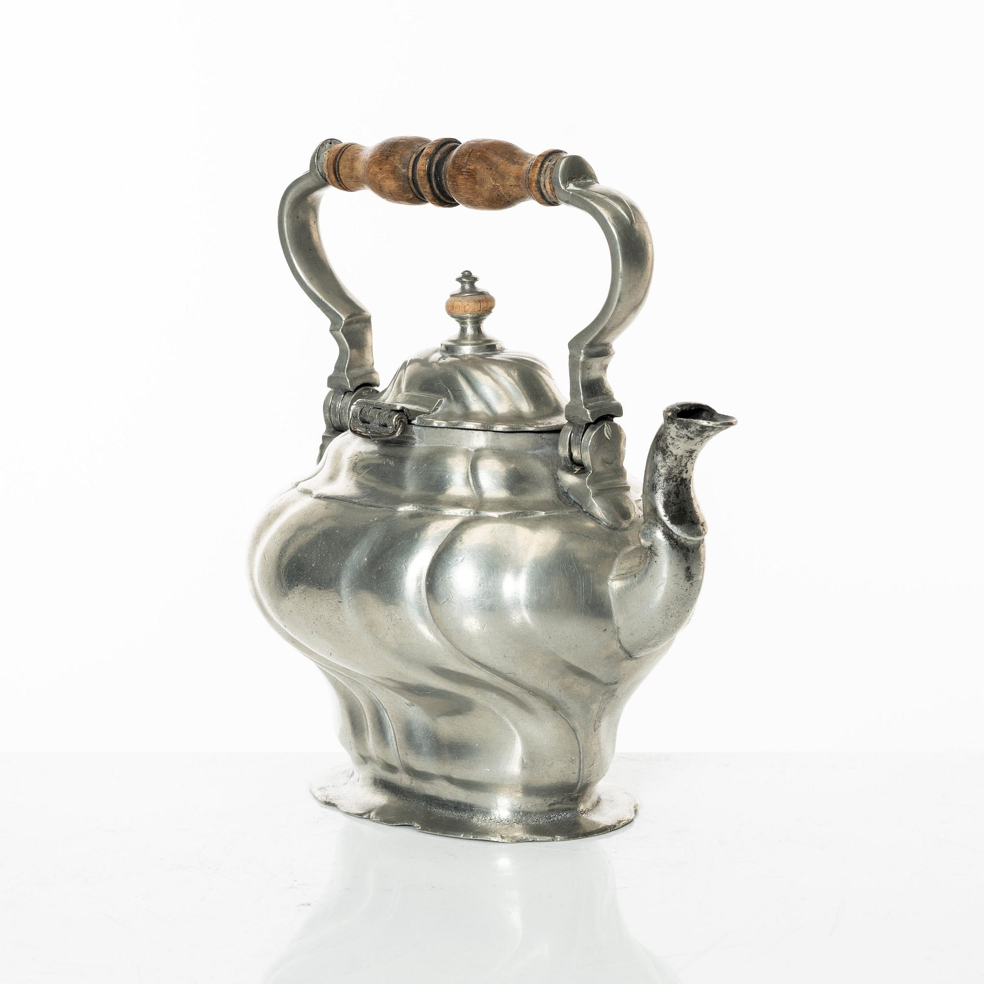 A Rococo pewter teapotby P J Mattsson 1808.
