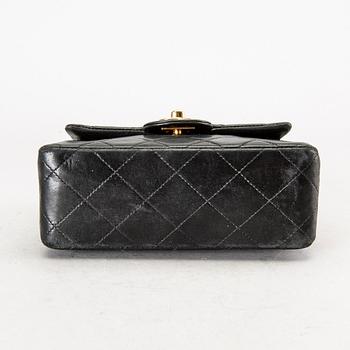 a 'Mini Flap' Chanel bag.