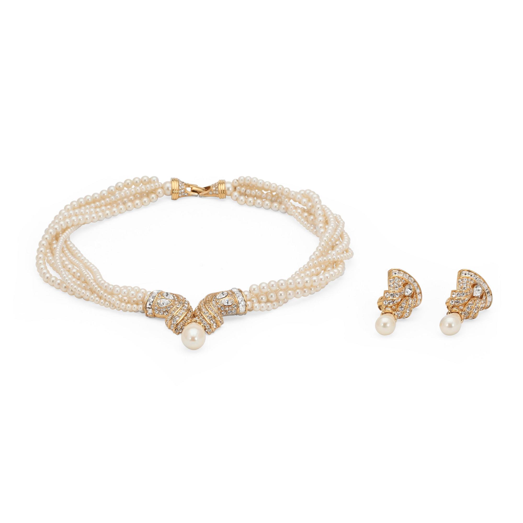 OSCAR DE LA RENTA, a necklace with white decorative pearls and clip earrings.