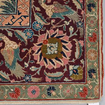 A CARPET, a semi-antique Tabriz figural, ca 327-333,5 x 236,5-240 cm.